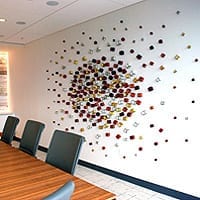 Cluster Exploding Oval | Approx 144”W x 96”H x 2”D | Medium: acrylic paint on (qty 266) wooden cubes | Installation: Atlanta | GA